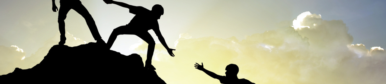 Image of climbers support each other